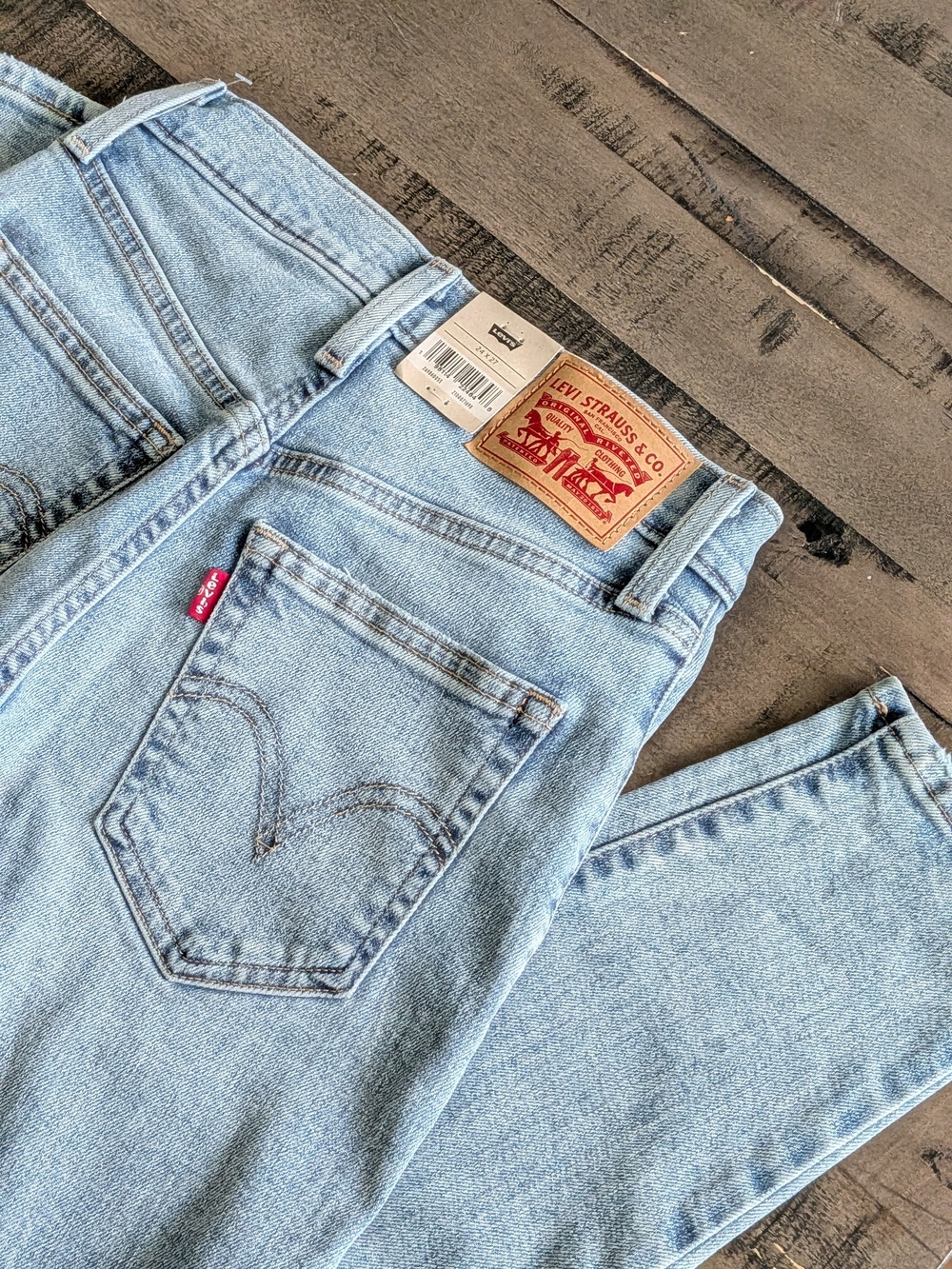 Levi's Light Wash High-Waisted Mom Jeans with Red Tab